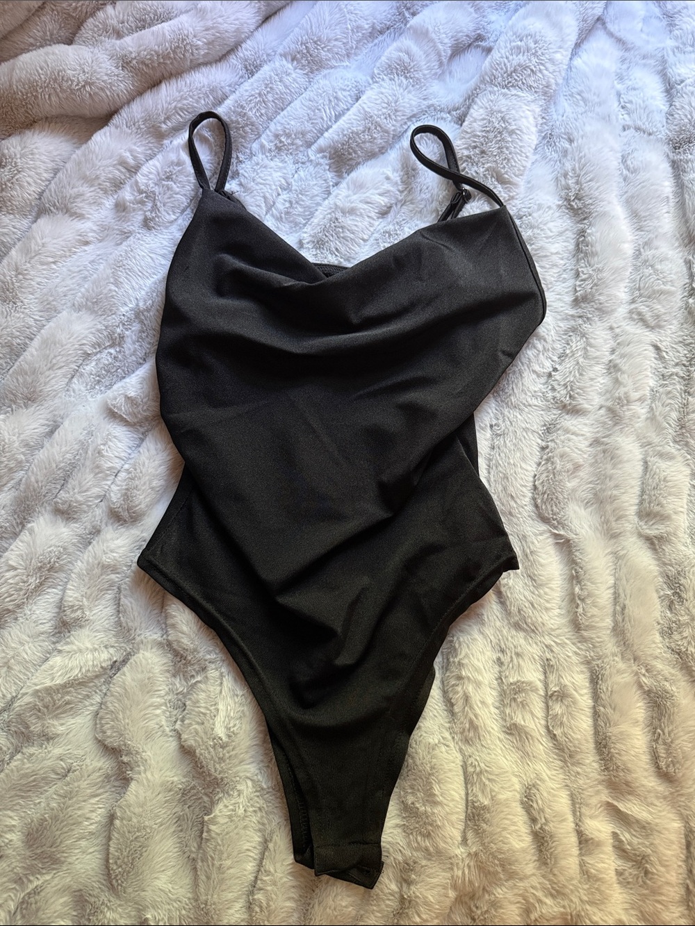 Black fitted body suit